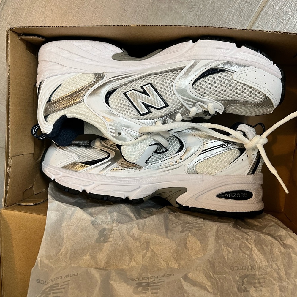 New Balance Black and White Athletic Shoes
